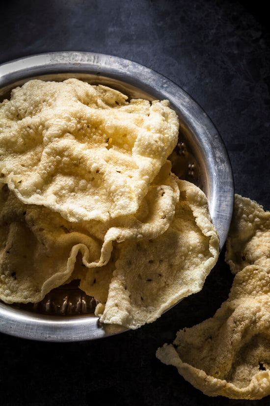 Bowl of deep fried kechiya, from Gujarati recipe book