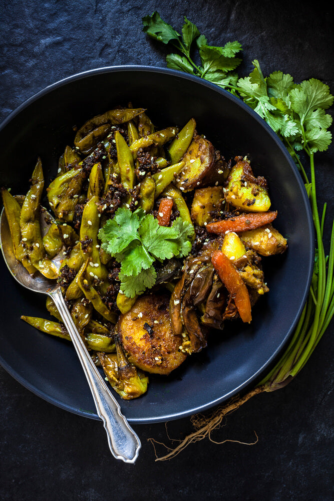 Undhiyu, a Gujarati dish made of vegetables, traditionally done in an clay pot in the earth